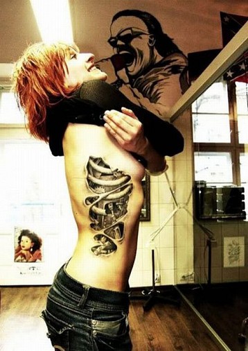 ripped-flesh-tattoo-3d-design-cool-robot-girl-inside-body-art-machine-bones-skin.jpg